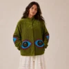 Lakshmi Jacket. Color verde manzana con ojo protector