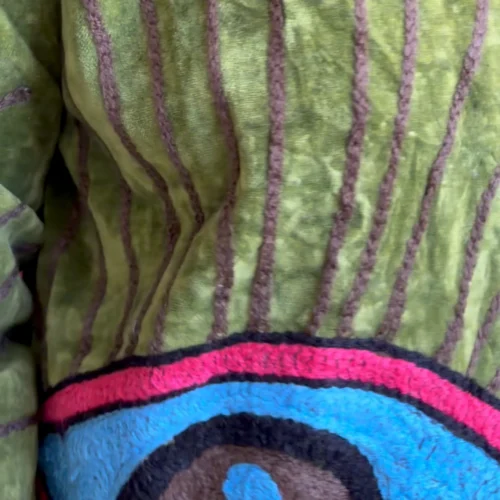 Lakshmi Jacket. Color verde manzana con ojo protector