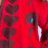 Lakshmi Jacket. Color rojo cereza con abanicos