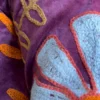 8 Lakshmi Jacket. Color berenjena con conejos
